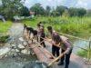 Polres Tanah Bumbu Dukung Pembangunan Jembatan di Kelurahan Tungkaran Pangeran Kecamatan Simpang Empat