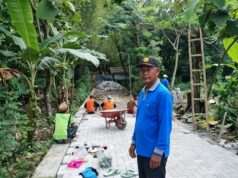 Pemdes BayemTaman Gunakan Dana Desa Untuk Pavingisasi Makam Tengah
